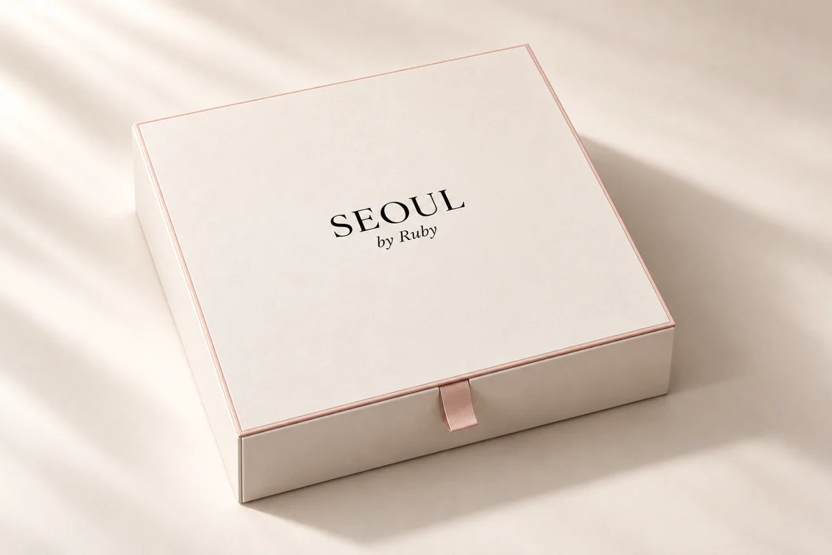 Seoul by Ruby warm ivory gift box with blush detailing, concept image.